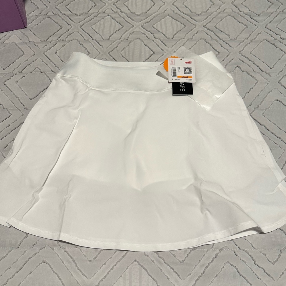 Ladies Golf Wear! Puma sleeveless top and cute skort bottom.